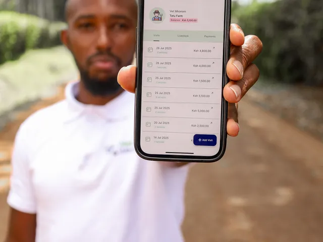 Veterinary professional demonstrating the Vet Mkononi app